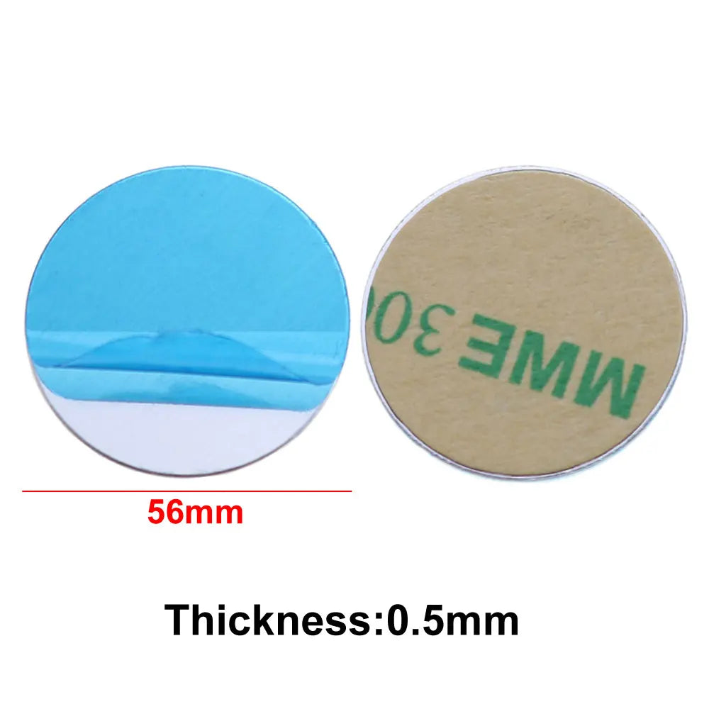 Two 56mm round adhesive discs: one with a blue peel-off cover, the other with a tan adhesive backing. 0.5mm thick.