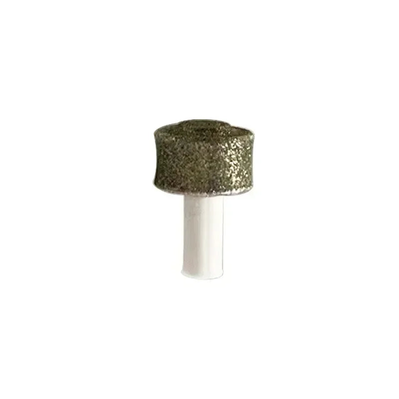 Replacement gold-coloured abrasive grinding head for pet nail trimmer with a white plastic stem.