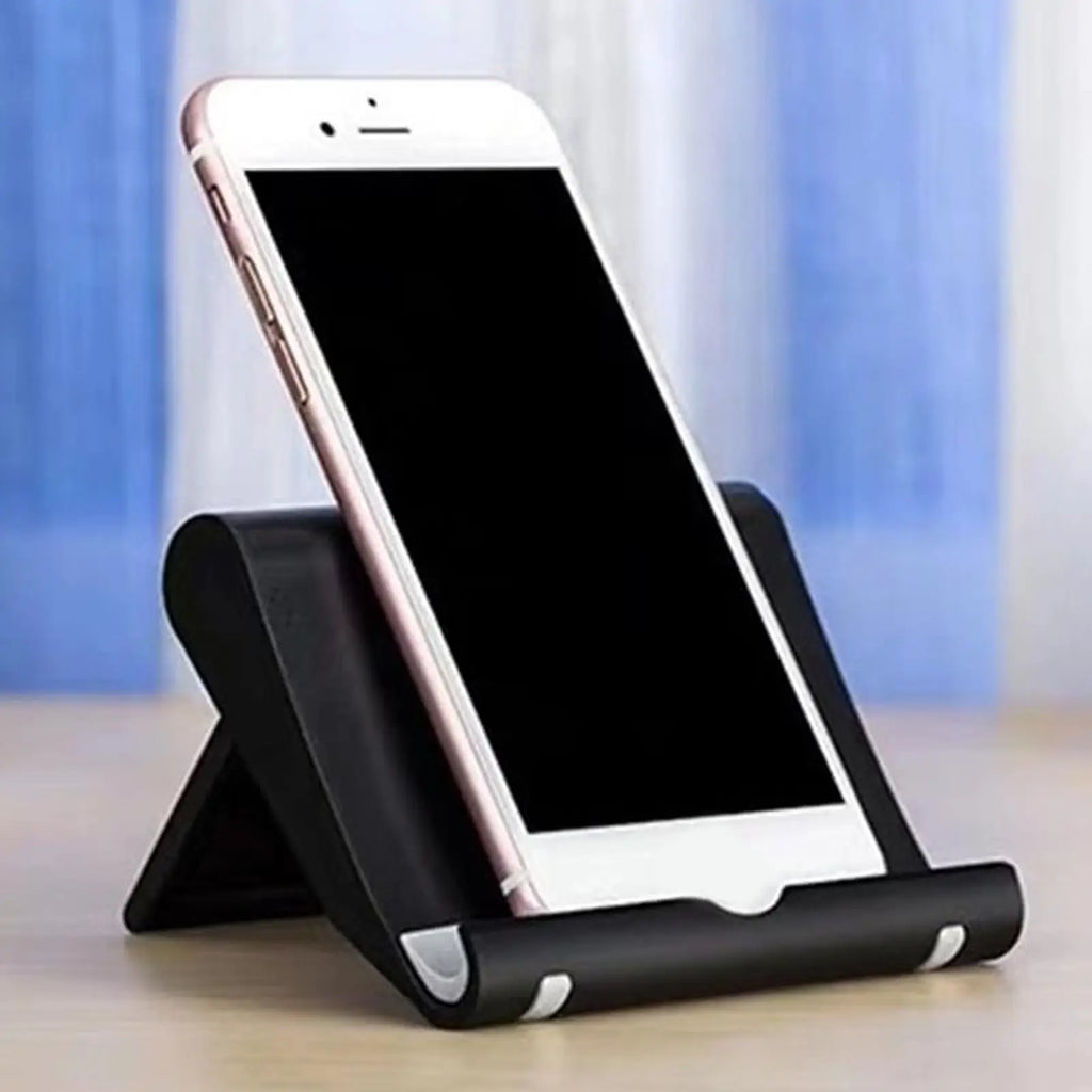 A white smartphone resting in an adjustable, black ergonomic mobile phone stand on a desk surface.