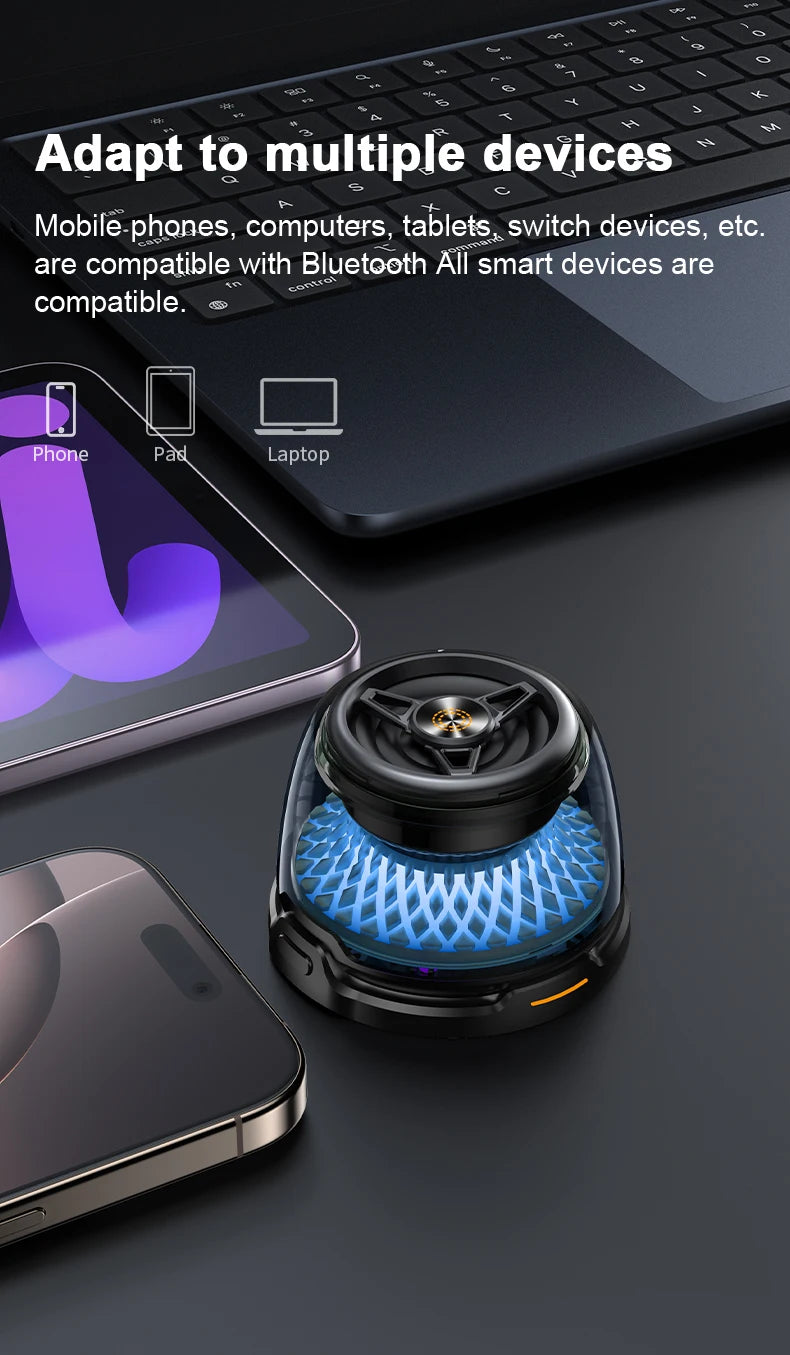 Small, black, portable Bluetooth speaker with a clear housing and an internal blue glowing light effect.