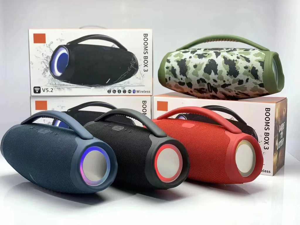A selection of portable 100W waterproof Bluetooth speakers in various colours, featuring top handles and RGB lighting.