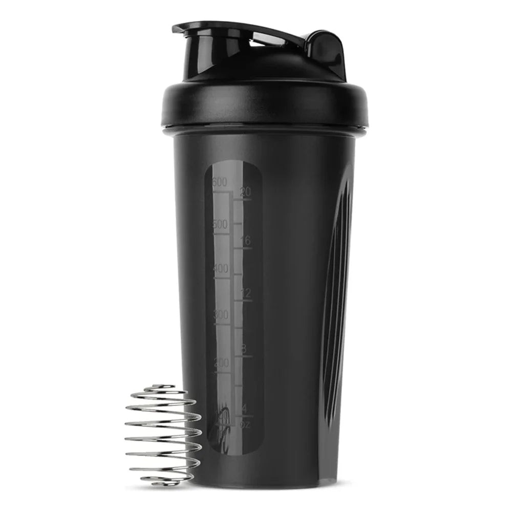 Black plastic protein shaker bottle with a flip-top lid, measurement markings, and a metal mixing ball.