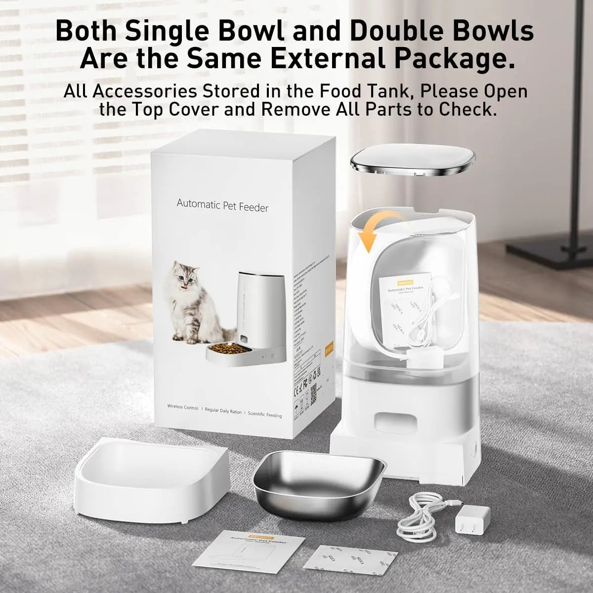 White automatic pet feeder with accessories, a metal bowl, and its product box displayed on a grey carpet.