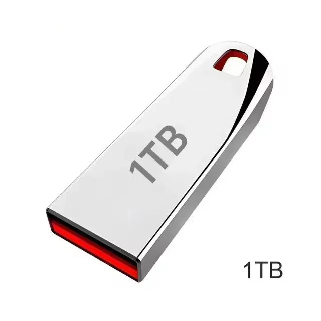 Sleek, silver-toned 1TB USB flash drive featuring a metallic finish and a red internal accent with a lanyard hole.