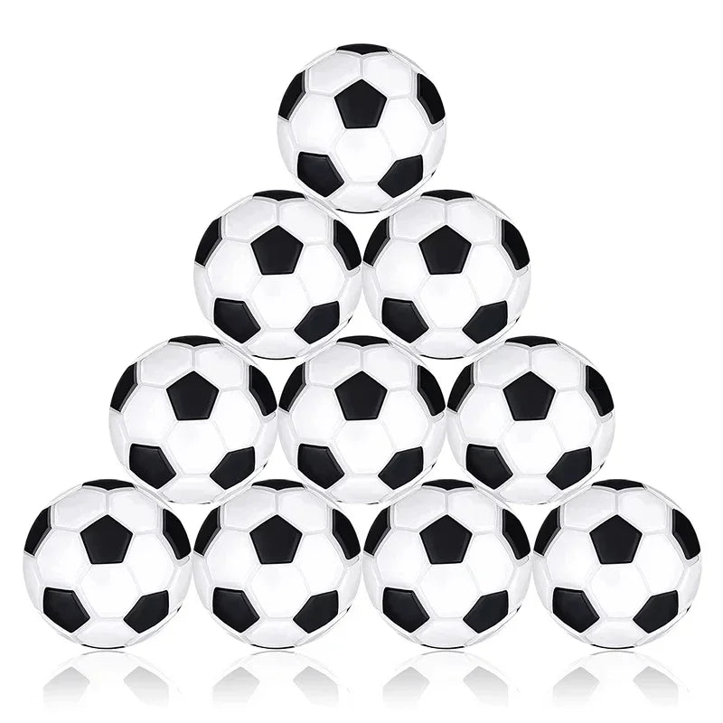 Pyramid stack of ten classic black and white pentagon-patterned footballs.