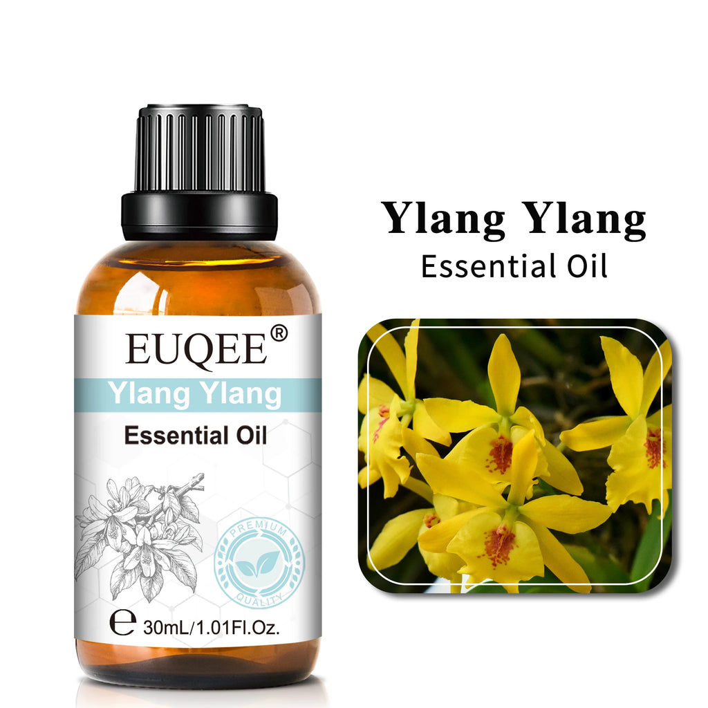 30ml amber glass bottle of Ylang Ylang essential oil with a black dropper cap and a floral label.