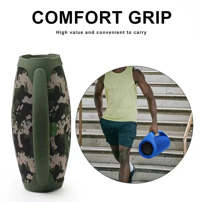 A portable, camouflage-patterned waterproof Bluetooth speaker with a comfort carry handle.