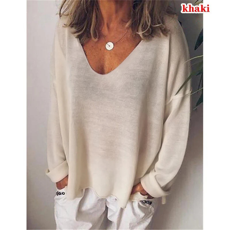 Khaki, loose-fit lightweight knit jumper with a deep V-neckline, long sleeves, and raw-edge hem.