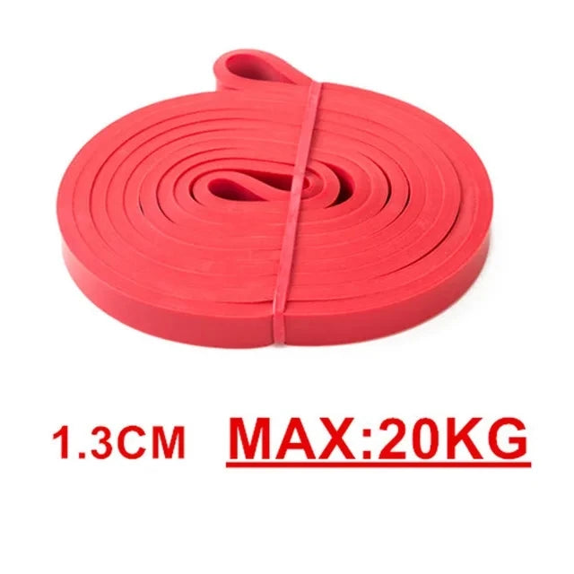 Red resistance loop band for exercise, 1.3cm wide with a 20kg maximum weight capacity.