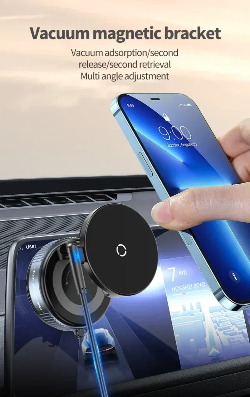 Black vacuum magnetic car phone mount attached to a dashboard, shown with a blue smartphone being held near it.
