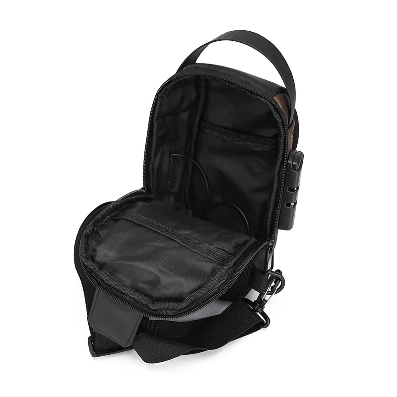 Open black anti-theft chest bag with internal organisation pockets and side USB charging port.