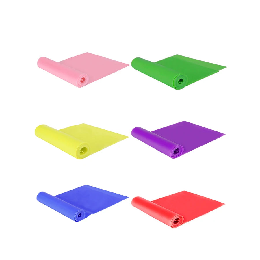 Six rolls of colourful fitness resistance bands in pink, green, yellow, purple, blue, and red against a white background.