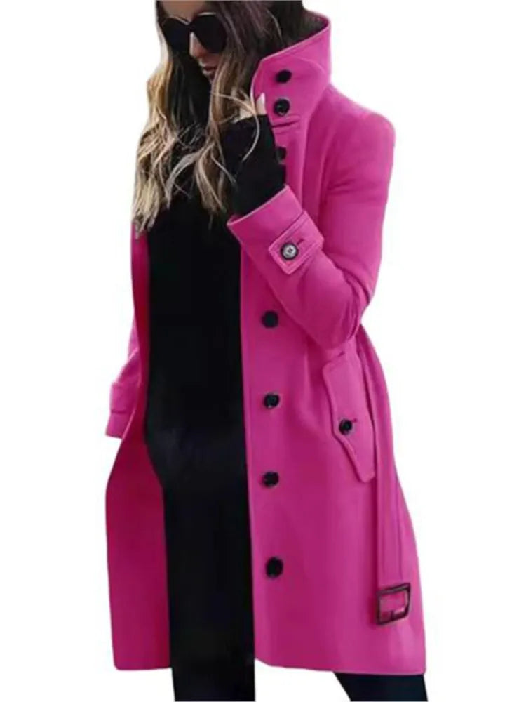 Vibrant hot pink trench-style coat with a high collar, button-down front, side pockets, and belted cuffs.