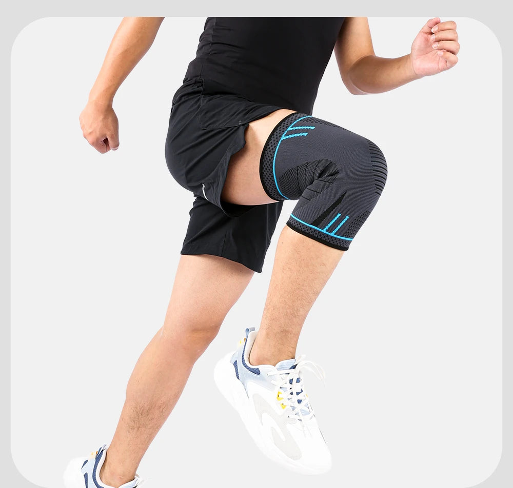 A person running, wearing a grey and blue compression knee support sleeve over their left knee.