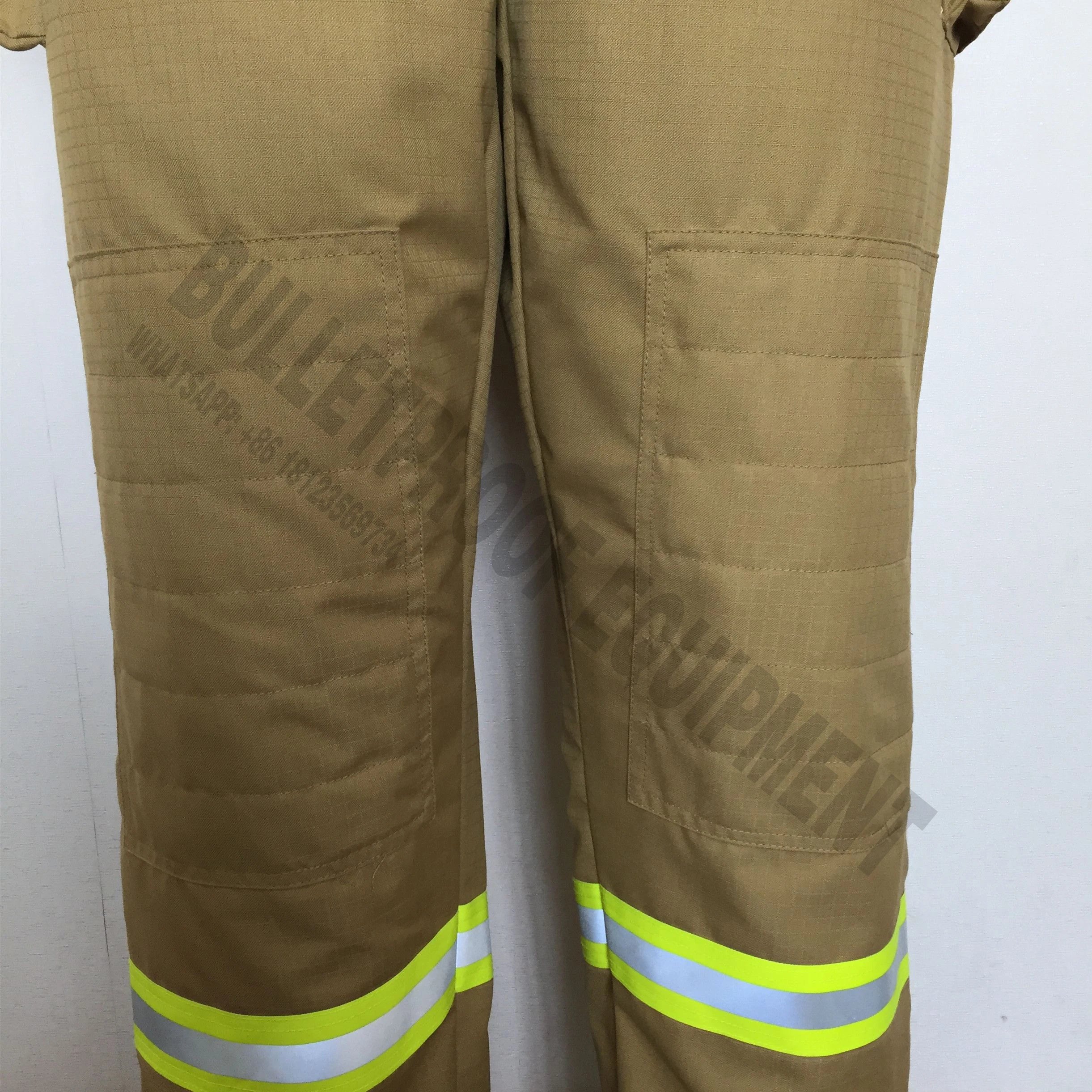 Tan firefighter pants with reinforced quilted knee patches and reflective yellow and silver safety strips at the ankles.