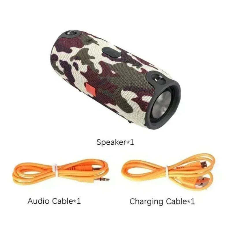 Cylindrical camo-pattern Bluetooth speaker with black trim, including one audio cable and one charging cable.