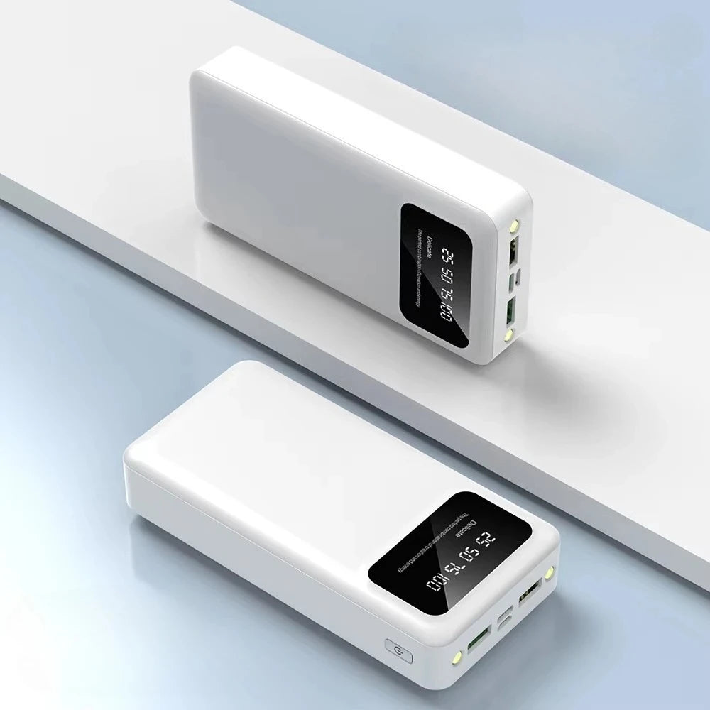 Two sleek white portable power banks with LED digital percentage displays and multiple USB ports.