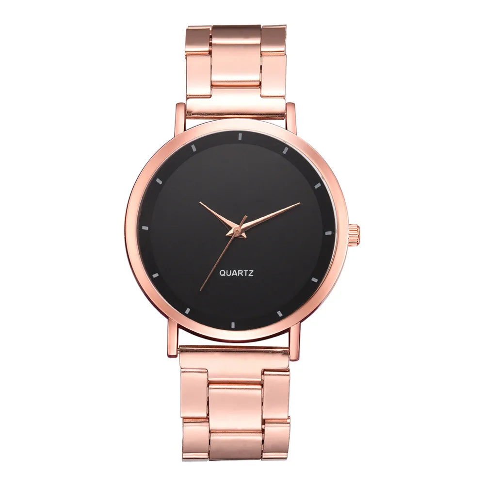 Ladies' rose gold stainless steel watch with a minimalist black dial and matching rose gold hands.