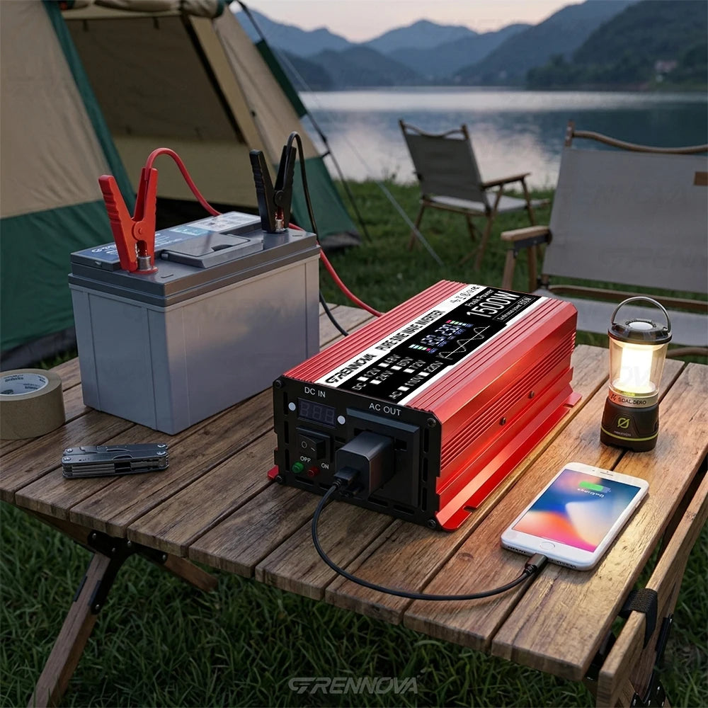 Red 1500W pure sine wave solar inverter with digital display, connected to a battery and charging a mobile phone.