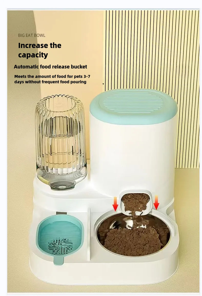 White and mint-green automatic pet feeder with a clear water reservoir and metal food bowl for cats and dogs.