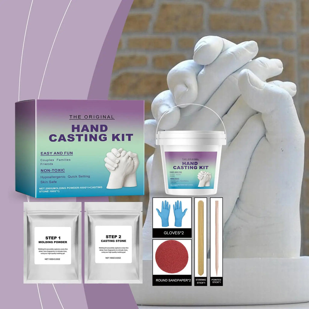 Hand casting kit with molding powder, casting stone, gloves, and tools to create a detailed white hand sculpture.