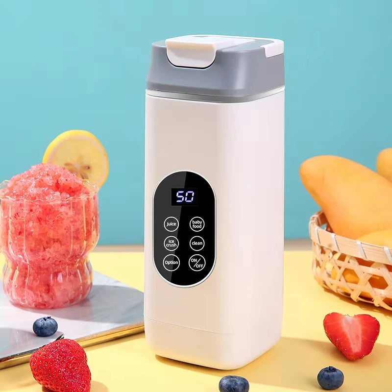 White portable blender with a grey lid, digital touch display, and multiple settings, surrounded by fresh fruit.