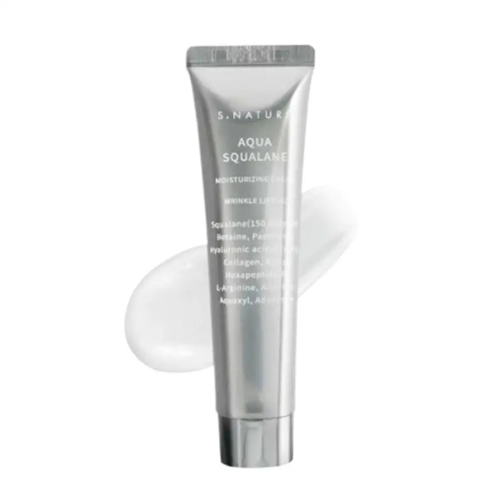 Silver squeeze tube of Aqua Squalane moisturizing cream with a white cream swatch behind it on a white background.