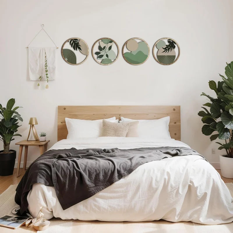 Four circular bohemian wooden wall art pieces featuring green and neutral abstract botanical and geometric designs.