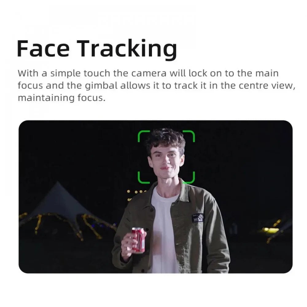 A young man in an olive green jacket standing at night with a green square face-tracking box overlaid on his face.
