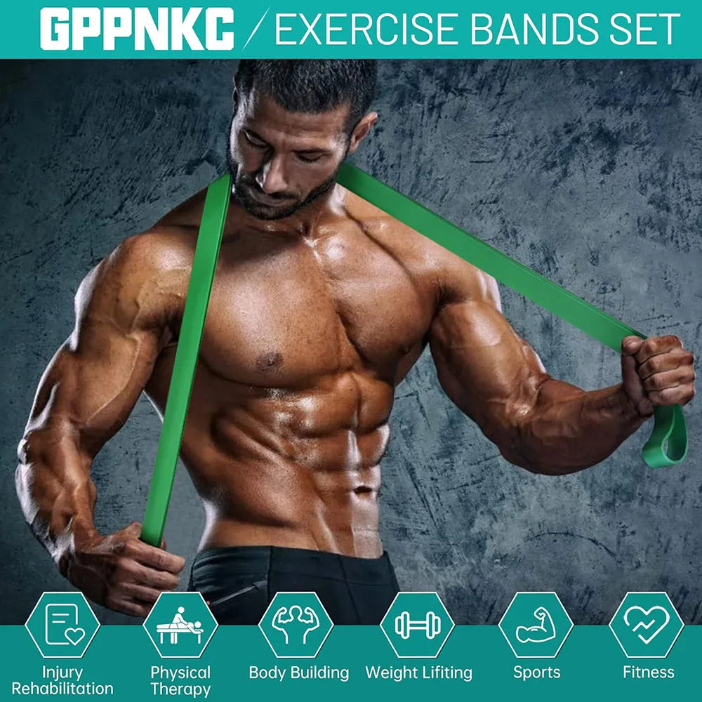 Muscular man posing with a long, green GPPNKC exercise resistance band around his neck.