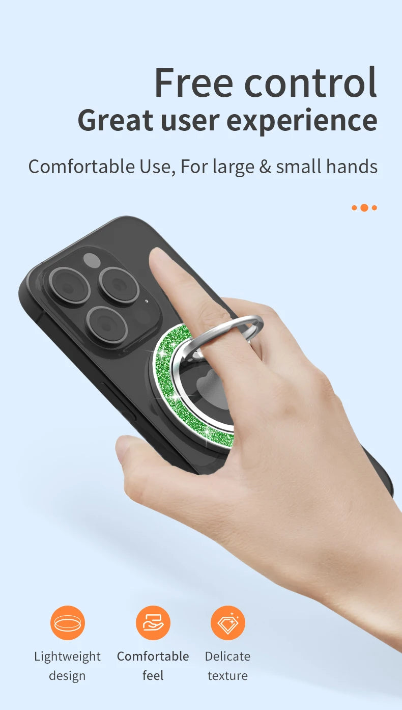 A finger holding a smartphone with a circular, sparkly green glitter phone ring holder attached to the back.
