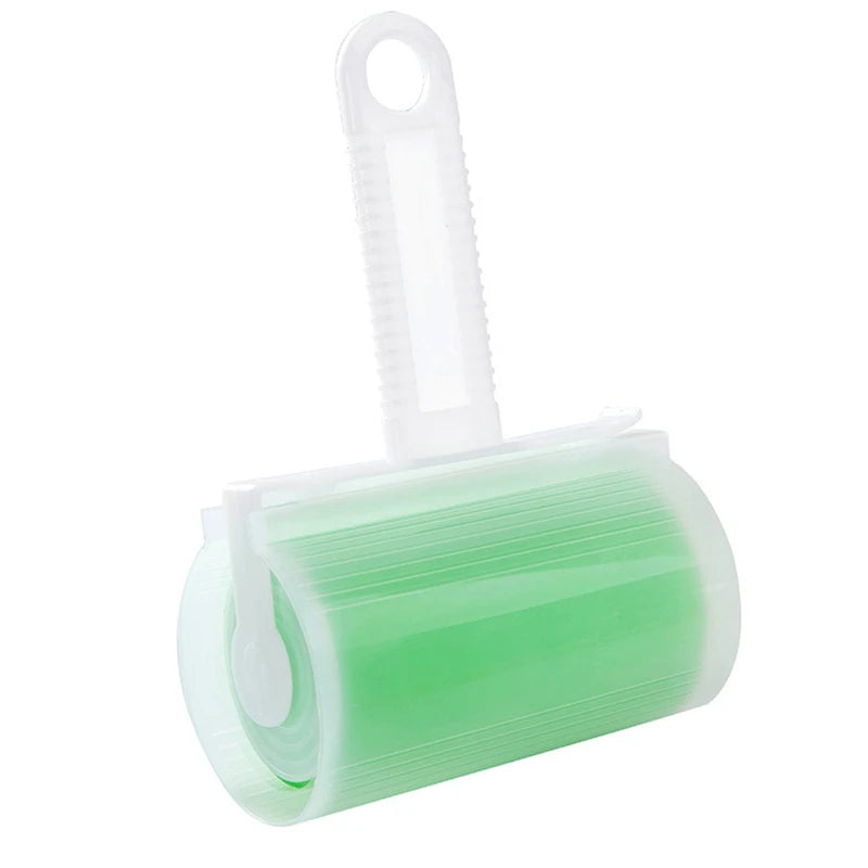 Reusable lint roller with a white handle and a bright green sticky silicone roller head.