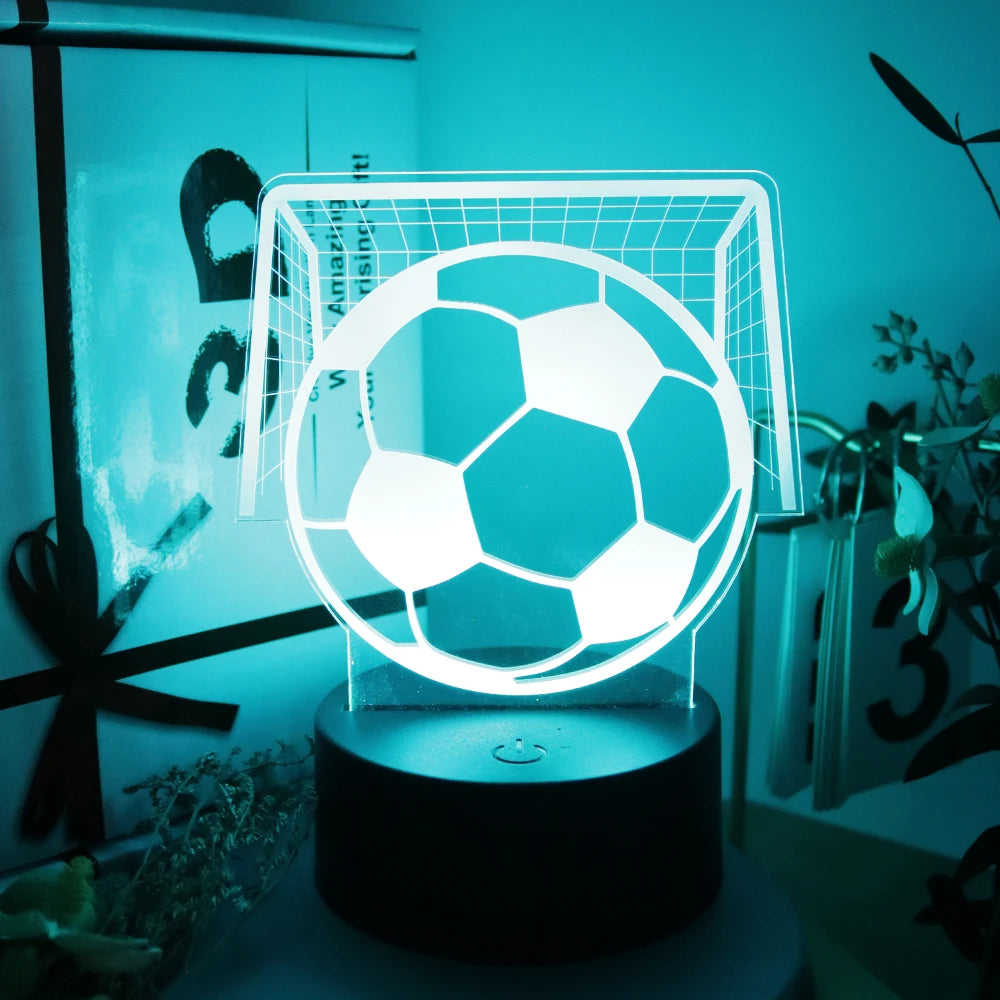 Glowing 3D LED lamp featuring a football and goal design on a round black base, illuminated in teal light.