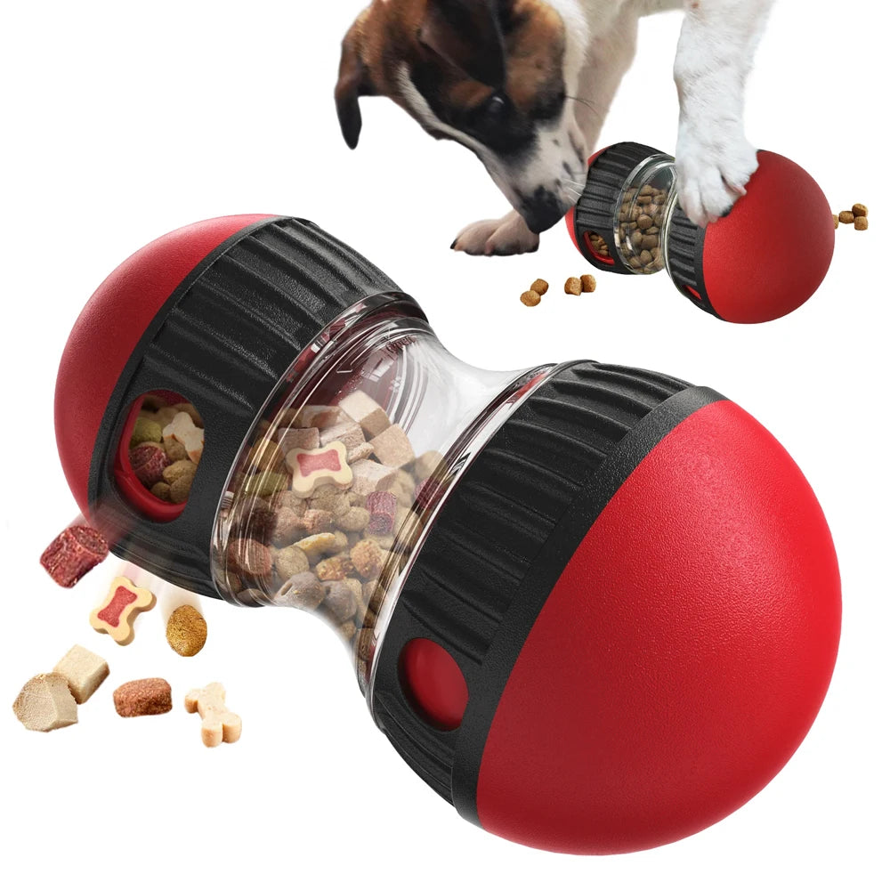 Red and black interactive dog treat-dispensing ball with a clear centre, shown with kibble being released during play.