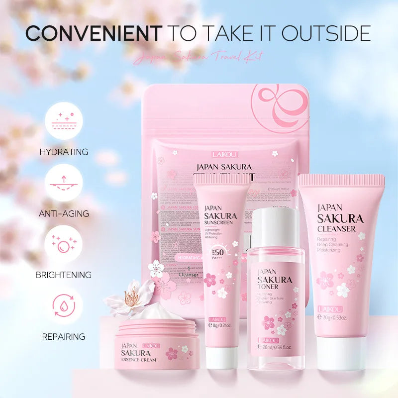 Pink Japan Sakura travel skincare kit containing a cleanser, toner, sunscreen, and cream for hydration and repair.