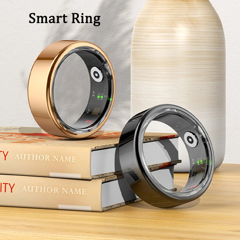 Two sleek smart rings in gold and black, showcasing internal health-monitoring sensors and a polished metallic finish.
