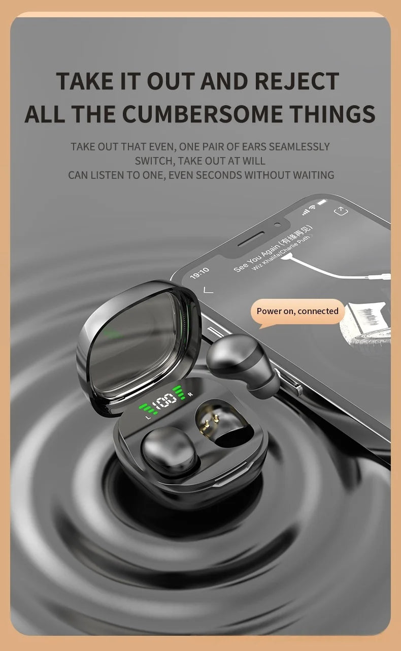 Black wireless earbuds in a charging case with a digital battery display, next to a smartphone.