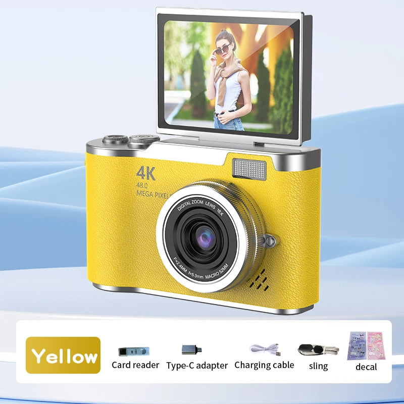 Yellow 4K digital camera with textured faux leather finish, flip-up screen, and lens, plus accessories.