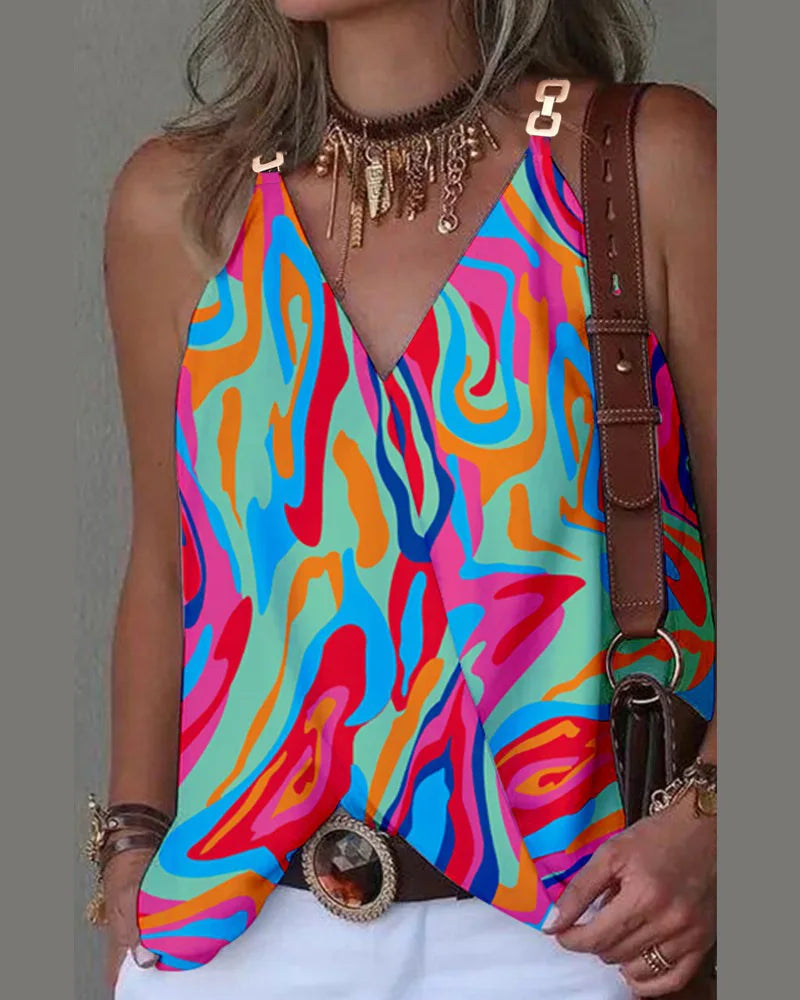 V-neck camisole top with colourful abstract swirl print, featuring gold chain-link shoulder straps.