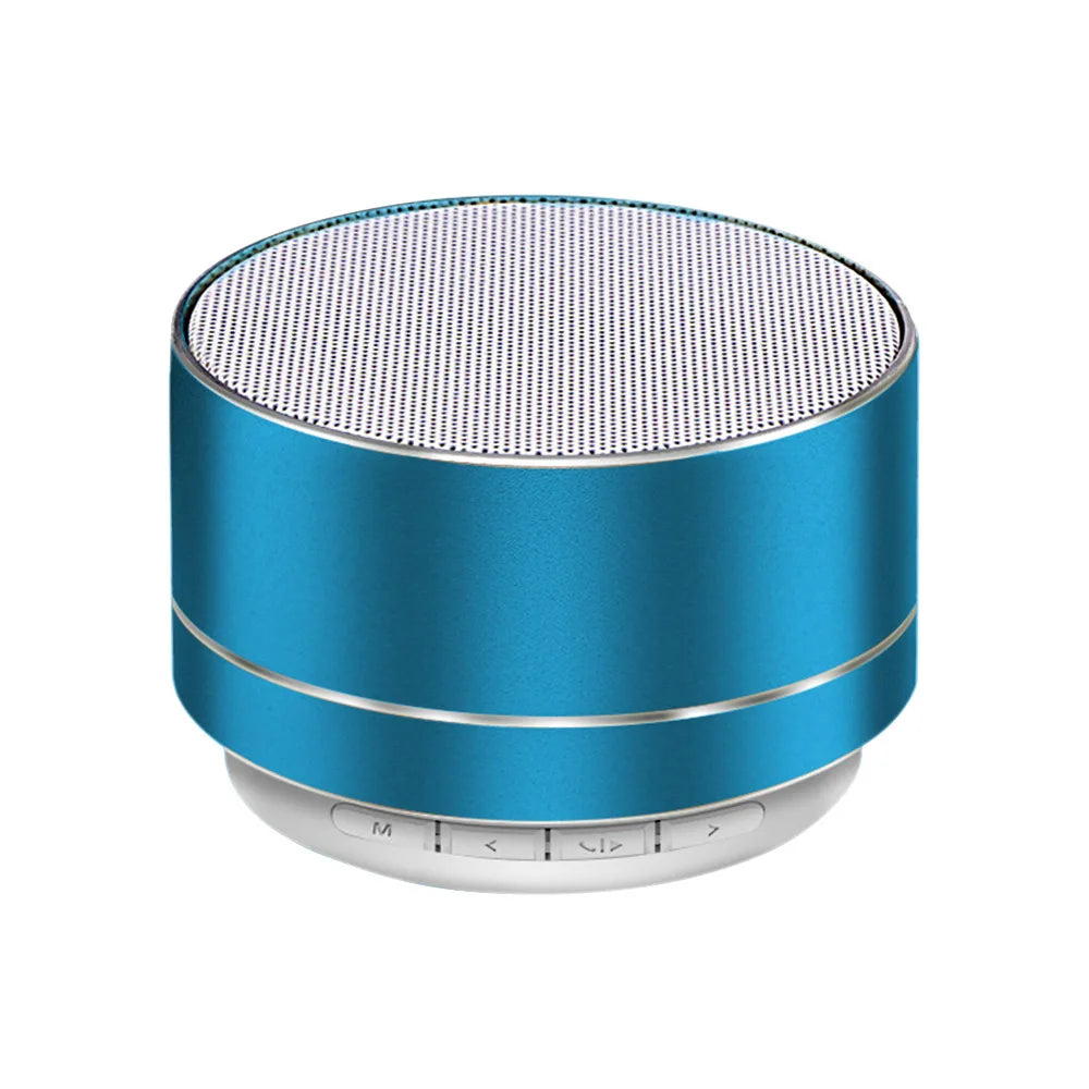 Round blue portable aluminium Bluetooth speaker with a white mesh top and control buttons on the base.