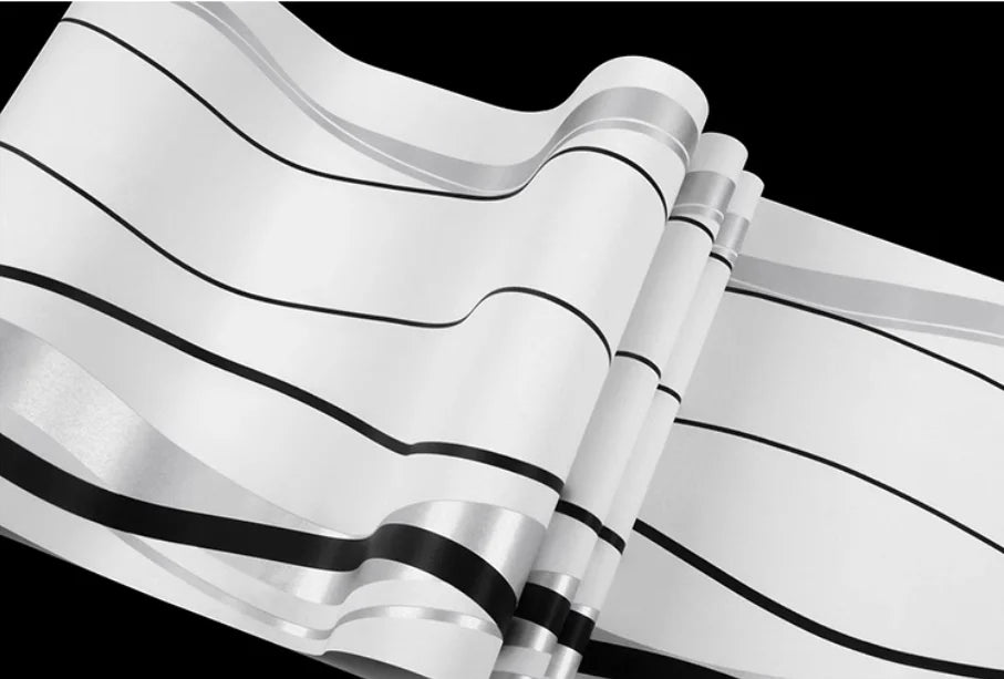 Modern wallpaper with a white background and sleek black and silver geometric horizontal stripes.