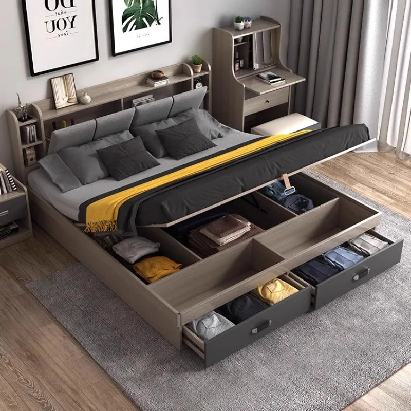 Modern grey upholstered bed with built-in headboard shelving and extensive under-bed lift-up and drawer storage.