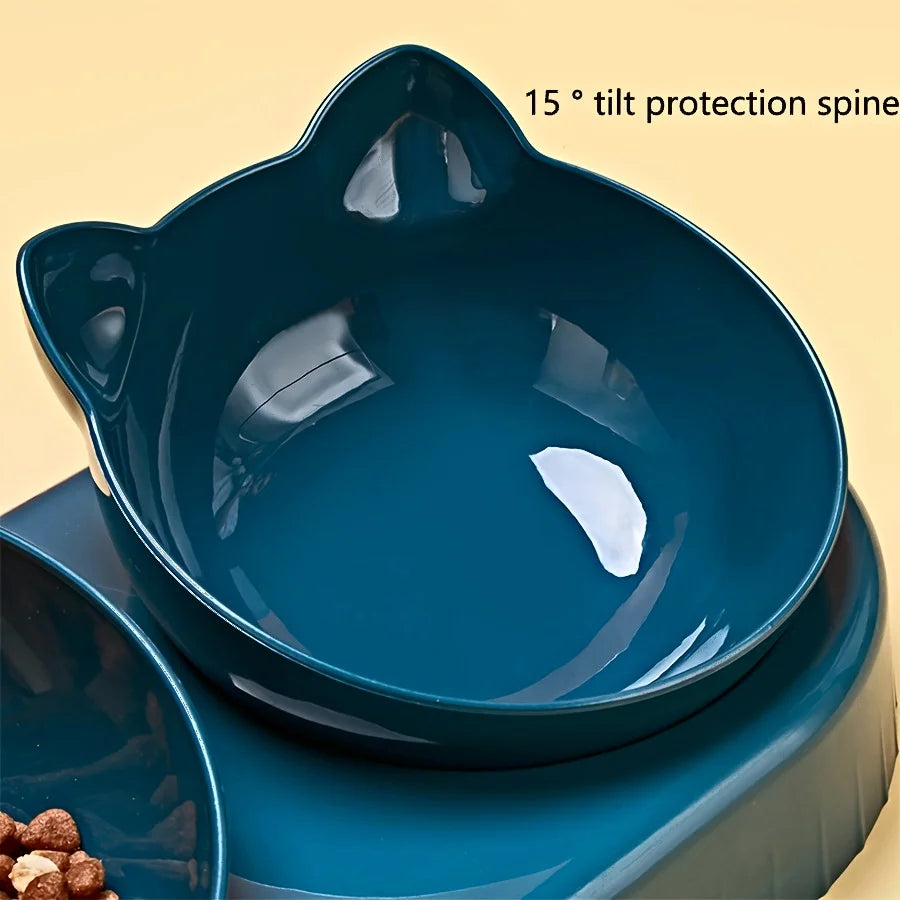 Dark teal cat-shaped pet feeding station with a 15-degree tilted bowl for comfortable eating.