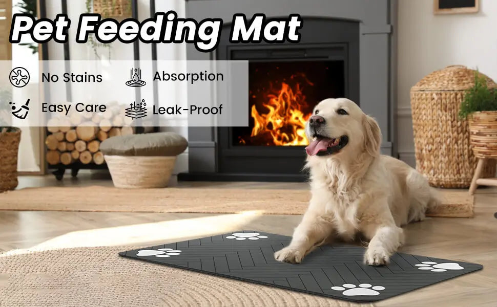 Grey rectangular pet feeding mat with white paw prints and a herringbone pattern, shown in front of a fireplace.