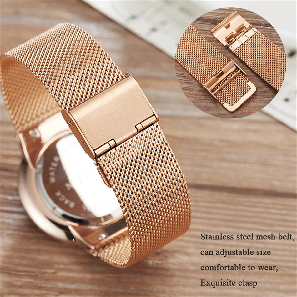 Elegant rose gold stainless steel women’s watch with an adjustable mesh strap and secure fold-over clasp.