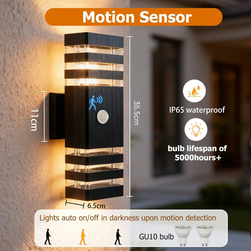 Modern black, rectangular outdoor LED wall light with motion sensor and dual-directional warm glow. IP65 waterproof.
