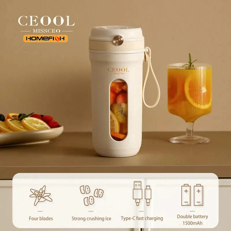 Beige portable electric blender with a clear viewing window, carrying strap, and modern, minimalist design.