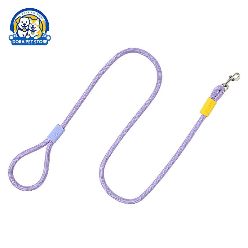 Lilac braided rope dog leash featuring a yellow accent sleeve and a silver metal clip.