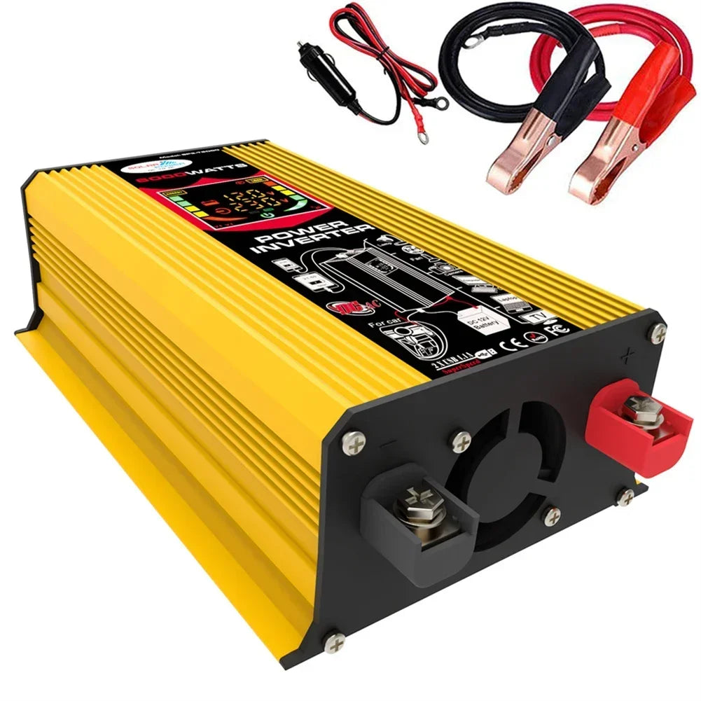 Yellow 6000W car power inverter with digital display, dual USB ports, and included battery cables and clips.