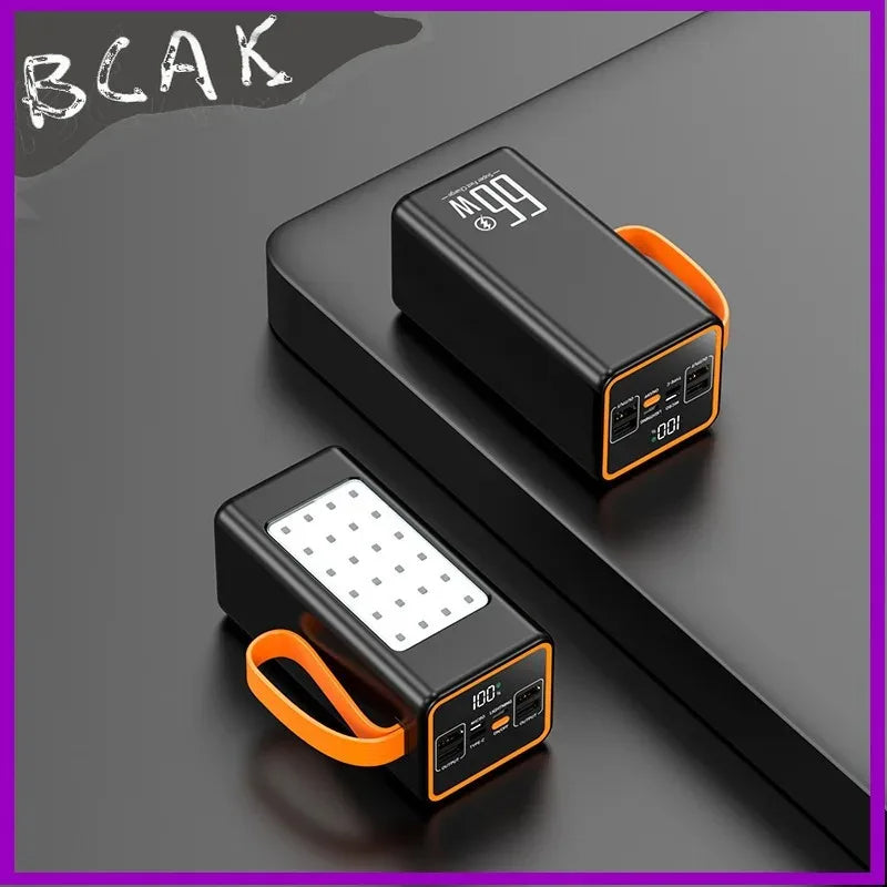 Two sleek black portable power banks with orange carry straps, LED digital displays and integrated LED camping lights.